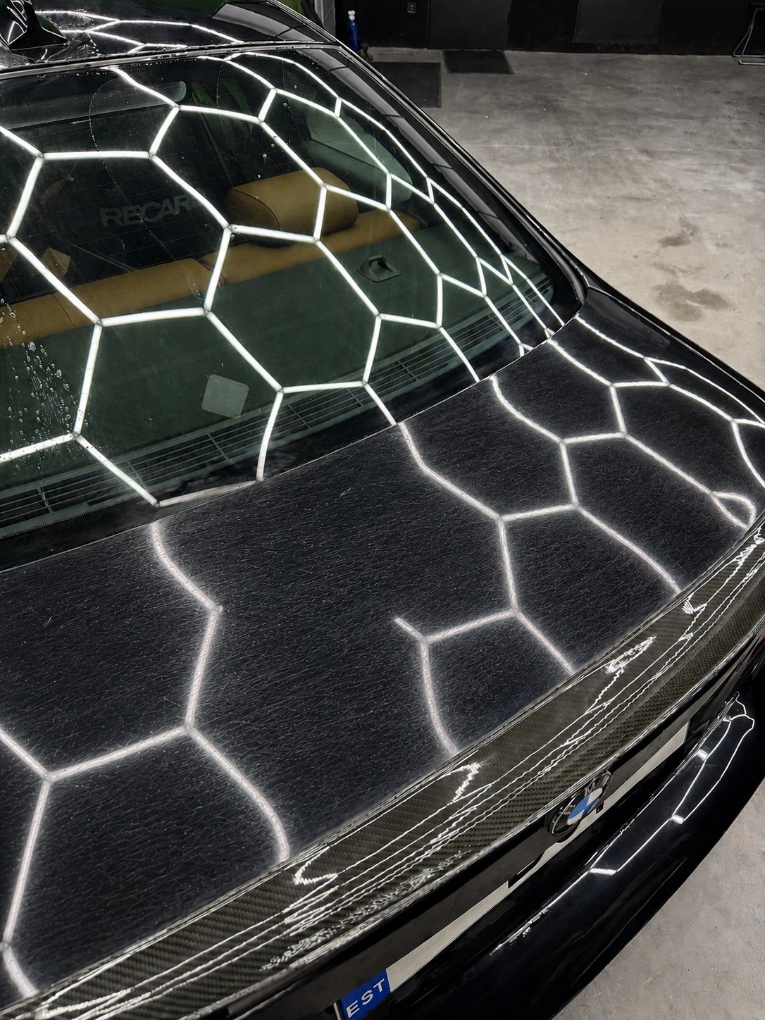 BMW before — swirled, hazy paint