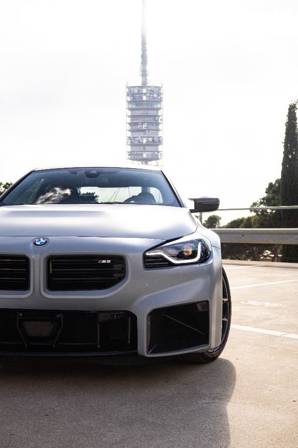 BMW M2 front end with Collserola tower behind
